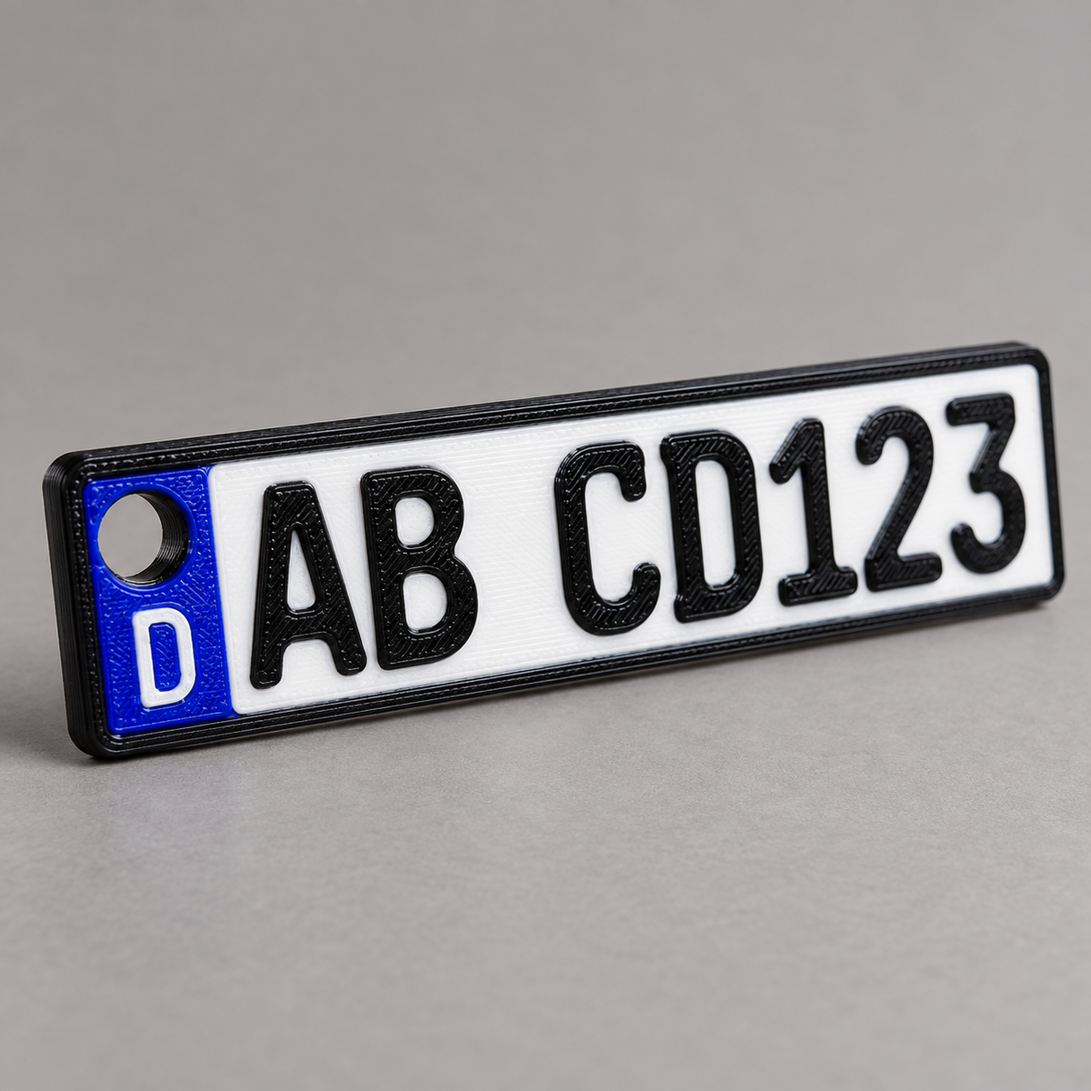 3D Kennzeichen Schlüsselanhänger – personalisiert (Mini Nummernschild, Wunschtext) | ab 9,99€