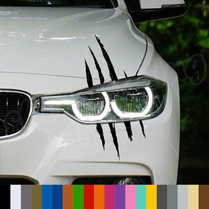 Aufkleber “KRATZER” auf Scheinwerfer | 15x40cm